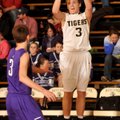 Josh Ferrell of West Fork pulls up for a 3-pointer Wednesday over Elkins defender Dillon Gash in Wes...