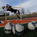 Javier Piedra works out during a goalkeeping drill Thursday at Rogers Heritage High School soccer pr...