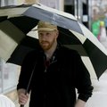 Will Simmons, an employee at the University of Arkansas, walks down Dickson Street in Fayetteville a...