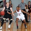 Tereke Eckwood, right, of Springdale High takes a swipe at the ball in the hands of Austin Haggard o...