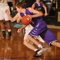 Elkins’ Dillon Gash drives past a West Fork defender during their Feb. 13 game in West Fork.