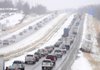 Traffic heading south on Interstate 540 slows Wednesday Feb. 20, 2013 between Springdale and Johnson. Snow fall in northwest Arkansas caused some traffic difficulties on the highway including vehicles that slid off the road. Springdale schools were closed an hour early due to the inclement weather.
