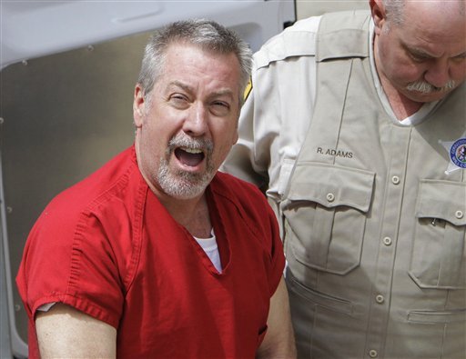 in-this-may-8-2009-file-photo-former-bolingbrook-ill-police-sergeant-drew-peterson-arrives-at-the-will-county-courthouse-in-joliet-ill-for-his-arraignment-on-charges-of-first-degree-murder-in-the-2004-death-of-his-third-wife-kathleen-savio-on-thursday-feb-21-2013-will-county-judge-edward-burmila-sentenced-peterson-to-38-years-in-prison-for-savios-murder