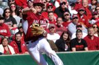 Arkansas infielder Willie Schwanke makes a play to throw out a Western Illinois runner in the second inning of Sunday afternoon's game at Baum Stadium in Fayetteville.