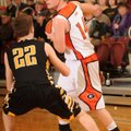 Gravette’s Quinten Parker looks to pass the ball during the Lions’ game Feb. 13 against Prairie Grov...