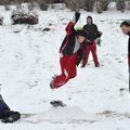 Anna Beth La Tour, 14 of Fayetteville, left, and University of Arkansas student Mitchell Loewen from...
