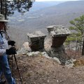 Hikers passed table-shaped rocks Friday during the bluff-top hike. 
