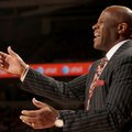 Arkansas head coach Mike Anderson shouts out to his team against Georgia in the second half Thursday...