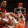 Arkansas guard BJ Young drives the ball Georgia Thursday at Bud Walton Arena. Young hit a game-winni...