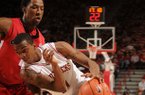 Arkansas guard BJ Young drives the ball Georgia Thursday at Bud Walton Arena. Young hit a game-winning shot with 5.3 seconds left as the Razorbacks won 62-60.