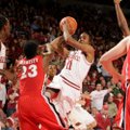 Arkansas’ BJ Young (11) eyes an opening against Georgia’s Sherrard Brantley on Thursday night at Wal...