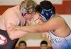 Drake Kendrick, left, of Springdale High will be among several contenders to try to knock off top-seeded Austin Hubble of Fayetteville in the heavyweight division of the Class 6A-7A state wrestling tournament, which begins at 1 p.m. today. 