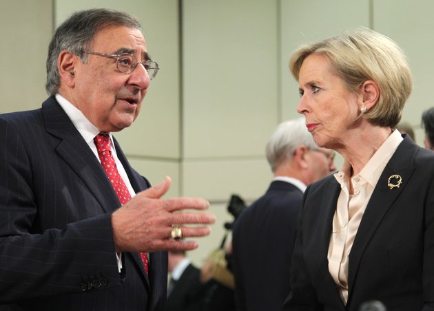 us-secretary-of-defense-leon-panetta-right-talks-with-his-norwegian-counterpart-anne-grete-strom-erichsen-at-the-start-of-a-two-day-nato-defense-ministers-meeting-to-discuss-syria-and-afghanistan-at-nato-headquarters-in-brussels-thursday-feb-21-2013-the-head-of-nato-urged-member-countries-thursday-to-stop-cutting-their-defense-budgets-in-response-to-tough-economic-times-saying-continued-reductions-will-compromise-the-safety-of-all-of-the-military-alliances-28-members