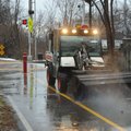 Dick Lingelbach, crew leader for Fayetteville’s Parks and Recreation Department, operates a sweeper ...
