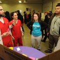 Brandon Miller of Farmington, left, and Jennifer Mattone of LIttle Rock, both senior nursing student...