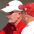 John McDonnell (left) spent 30 years as Arkansas' track & field and cross country coach. 