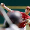 Arkansas starting pitcher Barrett Astin delivers a pitch against Evansville during the first inning ...