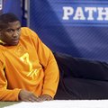 Arkansas tight end Chris Gragg watches a drill during the NFL football scouting combine in Indianapo...