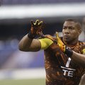 Arkansas tight end Chris Gragg runs a drill during the NFL football scouting combine in Indianapolis...