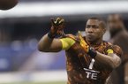 Arkansas tight end Chris Gragg runs a drill during the NFL football scouting combine in Indianapolis, Saturday, Feb. 23, 2013. (AP Photo/Dave Martin)