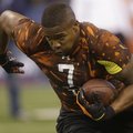 Arkansas tight end Chris Gragg runs a drill during the NFL football scouting combine in Indianapolis...