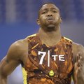 Arkansas tight end Chris Gragg runs a drill during the NFL football scouting combine in Indianapolis...