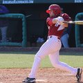 Tyler Spoon hits a grand slam home run during the eighth inning of a game against Evansville on Satu...