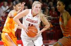 Arkansas sophomore Calli Berna tries to get through Tennessee junior Meighan Simmons (left) and sophomore Cierra Burdick during the second half on Sunday, Feb. 24, 2013, at Bud Walton Arena in Fayetteville.