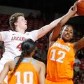 Arkansas senior Sarah Watkins and Tennessee freshman Bashaara Graves vie for a rebound during the se...