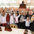 Arkansas athletes celebrate after the men's and women's teams won conference titles Sunday, Feb. 24,...