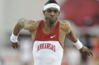 Arkansas senior Tarik Batchelor competes in the triple jump Sunday, Feb. 24, 2013, during the Southeastern Conference Indoor Track and Field Championships at the Randal Tyson Track Center in Fayetteville.