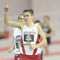 Arkansas junior Cameron Efurd celebrates at the tape after winning his preliminary heat of the mile ...