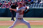 Trey Killian delivers a pitch during Arkansas' 10-2 win over Evansville on Feb. 24, 2012 at Baum Stadium in Fayetteville. 