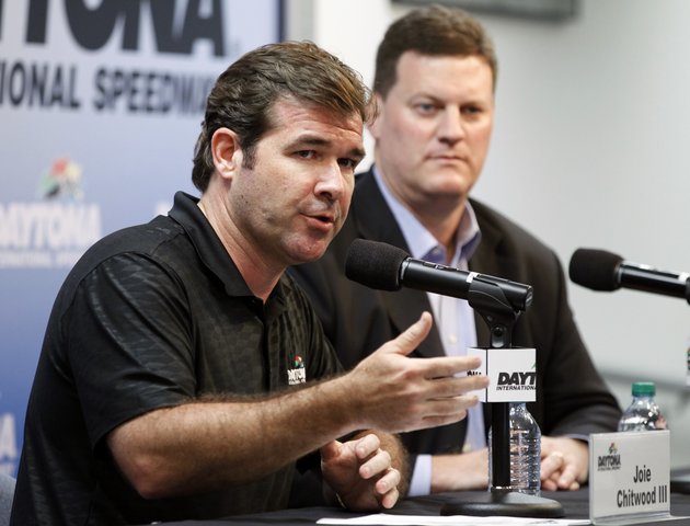 daytona-international-speedway-president-joie-chitwood-iii-left-speaks-at-news-conference-with-steve-odonnell-nascar-senior-vice-president-after-numerous-spectators-were-injured-when-driver-kyle-larsons-car-crashed-in-a-catch-fence-on-the-last-lap-of-the-nascar-nationwide-series-auto-race-saturday-feb-23-2013-in-daytona-beach-fla-larsons-crash-sent-car-parts-and-other-debris-flying-into-the-stands