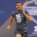 Arkansas quarterback Tyler Wilson runs the 40-yard dash at the NFL football scouting combine in Indi...