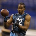 Arkansas receiver Cobi Hamilton runs a drill at the NFL football scouting combine in Indianapolis, S...