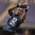 Arkansas receiver Cobi Hamilton runs a drill at the NFL football scouting combine in Indianapolis, S...