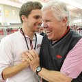 Arkansas women's track and field coach Lance Harter, right, is congratulated by men's manager Georg ...