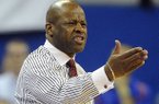 Arkansas coach Mike Anderson react to a call during the second half of an NCAA college basketball game against Florida in Gainesville, Fla., Saturday, Feb. 23, 2013. Florida won 71-54. (AP Photo/Phil Sandlin)