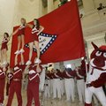 University of Arkansas band and cheerleaders perform on University of Arkansas Day at the Arkansas s...