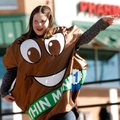 Samantha Thiele, 11, with Girl Scout Troop 5064 in Rogers, tries to encourage sales of Girl Scout co...