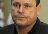 University of Tennessee NCAA college assistant football coach Sam Pittman talks to reporters at the indoor practice facilty on the school campus in Knoxville, Tenn., Wednesday, Feb. 8, 2012. (AP Photo/The Knoxville News Sentinel, Michael Patrick)