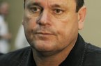 University of Tennessee NCAA college assistant football coach Sam Pittman talks to reporters at the indoor practice facilty on the school campus in Knoxville, Tenn., Wednesday, Feb. 8, 2012. (AP Photo/The Knoxville News Sentinel, Michael Patrick)
