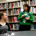 Karen Steen, Rogers Heritage High principal, introduces senior Megan Seiler during a ceremony Monday...