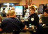 
Holley Garrett, dealer at Cherokee Casino and Hotel, at the three card poker table Monday, Feb. 25, 2013 at the casino in West Siloam Springs, Okla. The casino has a number of machines, tables, poker room and off track betting room.