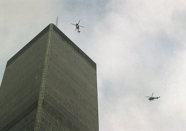 in-this-file-photo-of-feb-26-1993-helicopters-jockey-for-position-over-the-world-trade-center-in-new-york-following-a-noontime-blast-which-rocked-the-twin-towers-complex