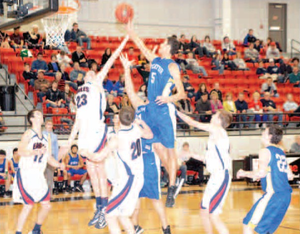 Decatur’s Mario Urquidi went up for a shot during Friday’s game against Conway Christian. The Bulldogs lost the regional tournament game, 59-49.