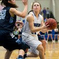 Libby Ganoung of Rogers goes up for shot Feb. 22 at Rogers High. Ganoung, a sophomore, is usually on...