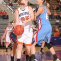 Lacey Murray, Rogers Heritage senior forward, looks to pass out of a trap as Fort Smith Southside ju...