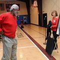 Nancy Allen, right, board president of the Southeast Fayetteville Community Center, smiles as Nolan ...